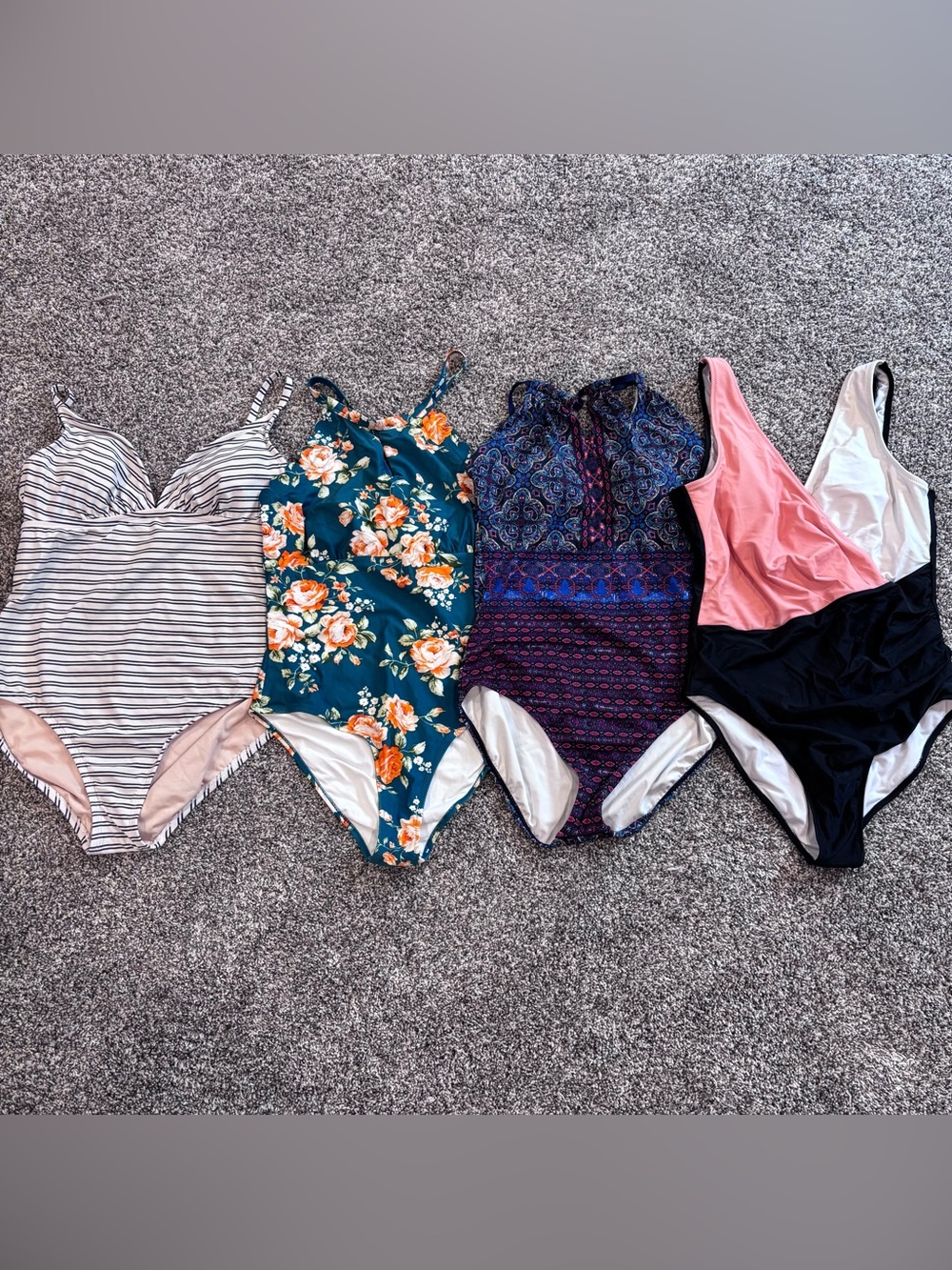 Lot of 4 women’s swim suits size large
